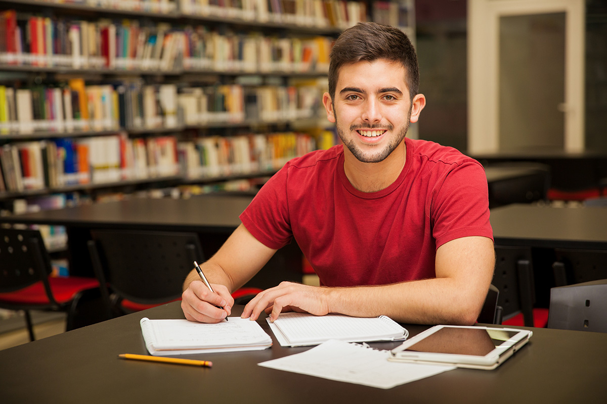 teen working at desk